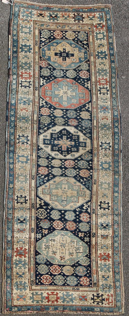 A Shirvan blue ground runner, c.1880, 10ft 4in by 3ft 8in.